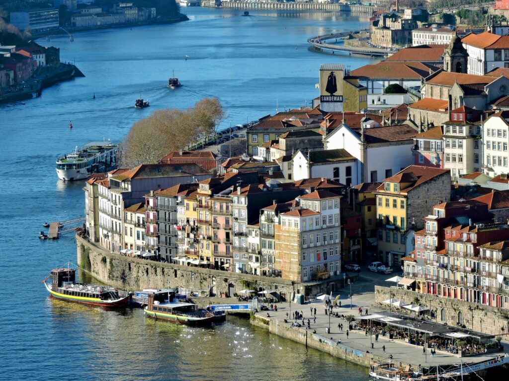 Colorful buildings along Porto Ribeira waterfront and Douro River Portugal
